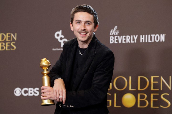 Timothée Chalamet ganó su primer Globo en su quinta nominación. Foto Reuters